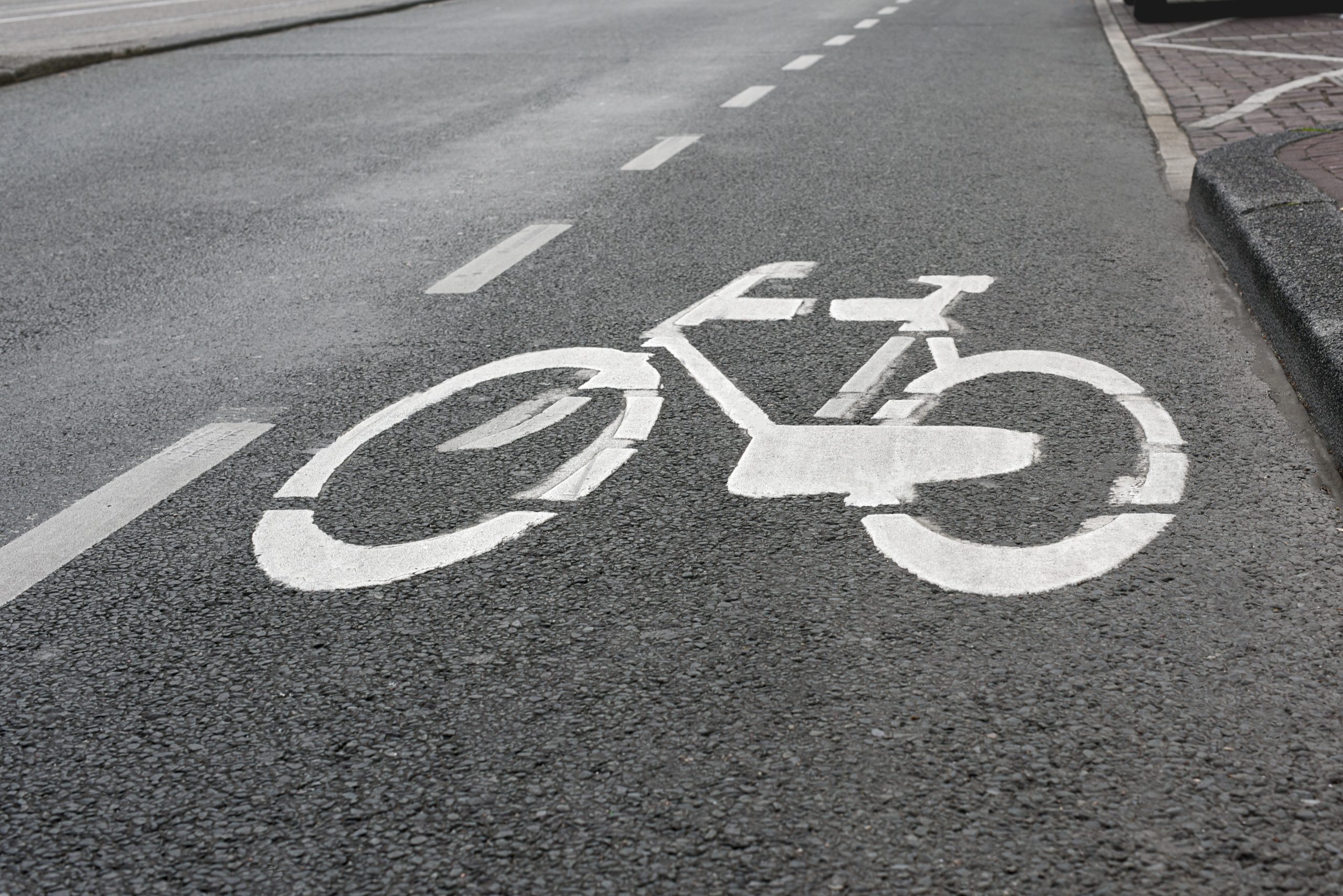 Sign bike on the pavement. Symbol to indicate the road for bicycles. Bike path
